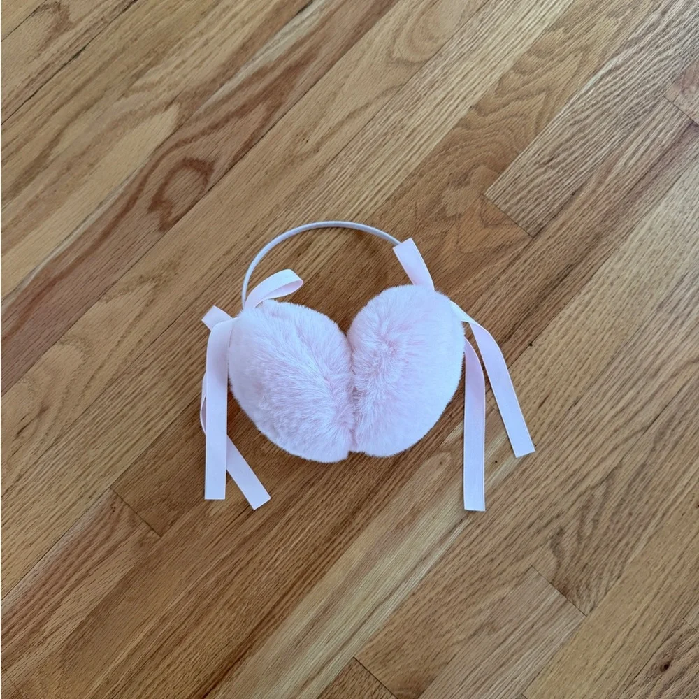 Light pink Pom Pom ear muffs fluffy with bows